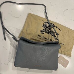 Authentic Burberry Ash Grey Grained leather crossbody bag.